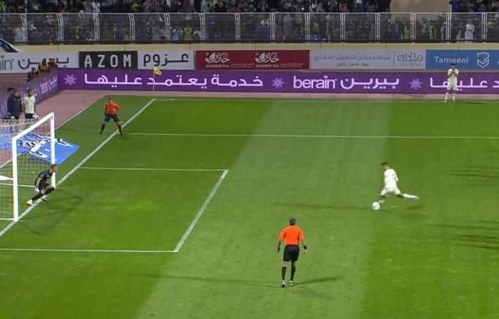 Cristiano Ronaldo pictured taking a penalty to score his first ever Al Nassr goal